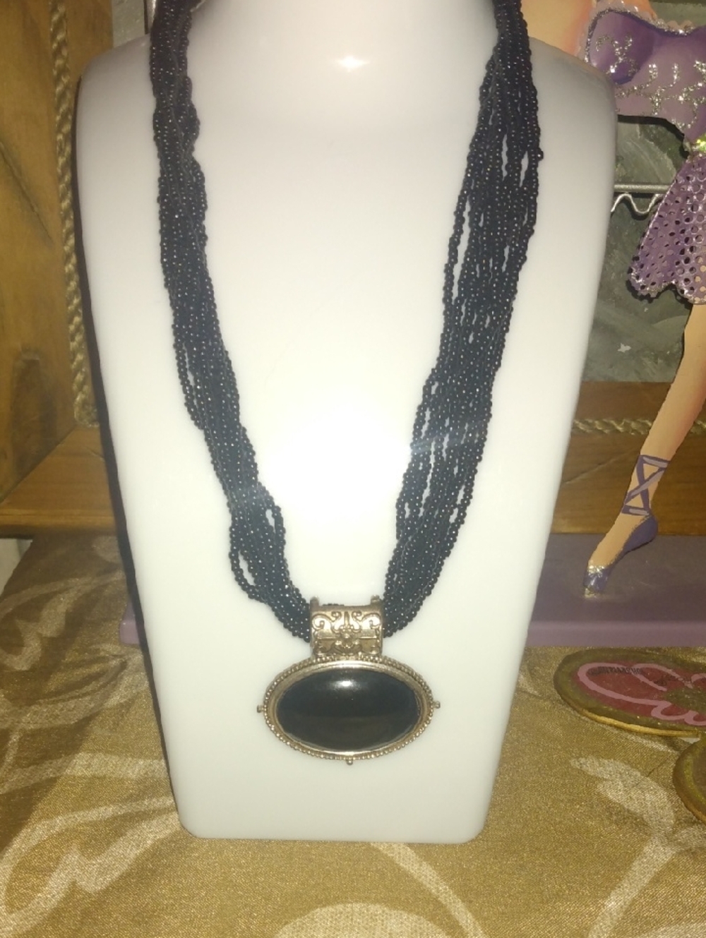 Black Beaded Multi-Strand Necklace with Oval Pendant